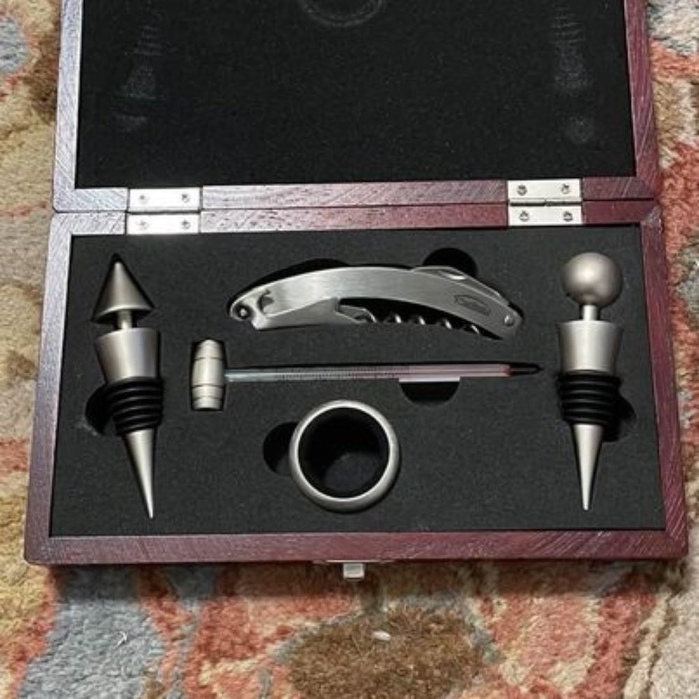 Corkscrew kit in wooden storage box